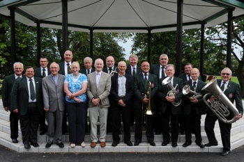 Garvey Silver Band with conductor Tom Whyte pictured at Hymns in the Park held at the refurbished bandstand in Wallace Park.  Included are from left: Rev Winston Good (Seymour Street Methodist), Marion Craig (First Lisburn Presbyterian), Rev Brian Gibson (Railway Street Presbyterian) and Denis Fullerton (Lisburn Cathedral).